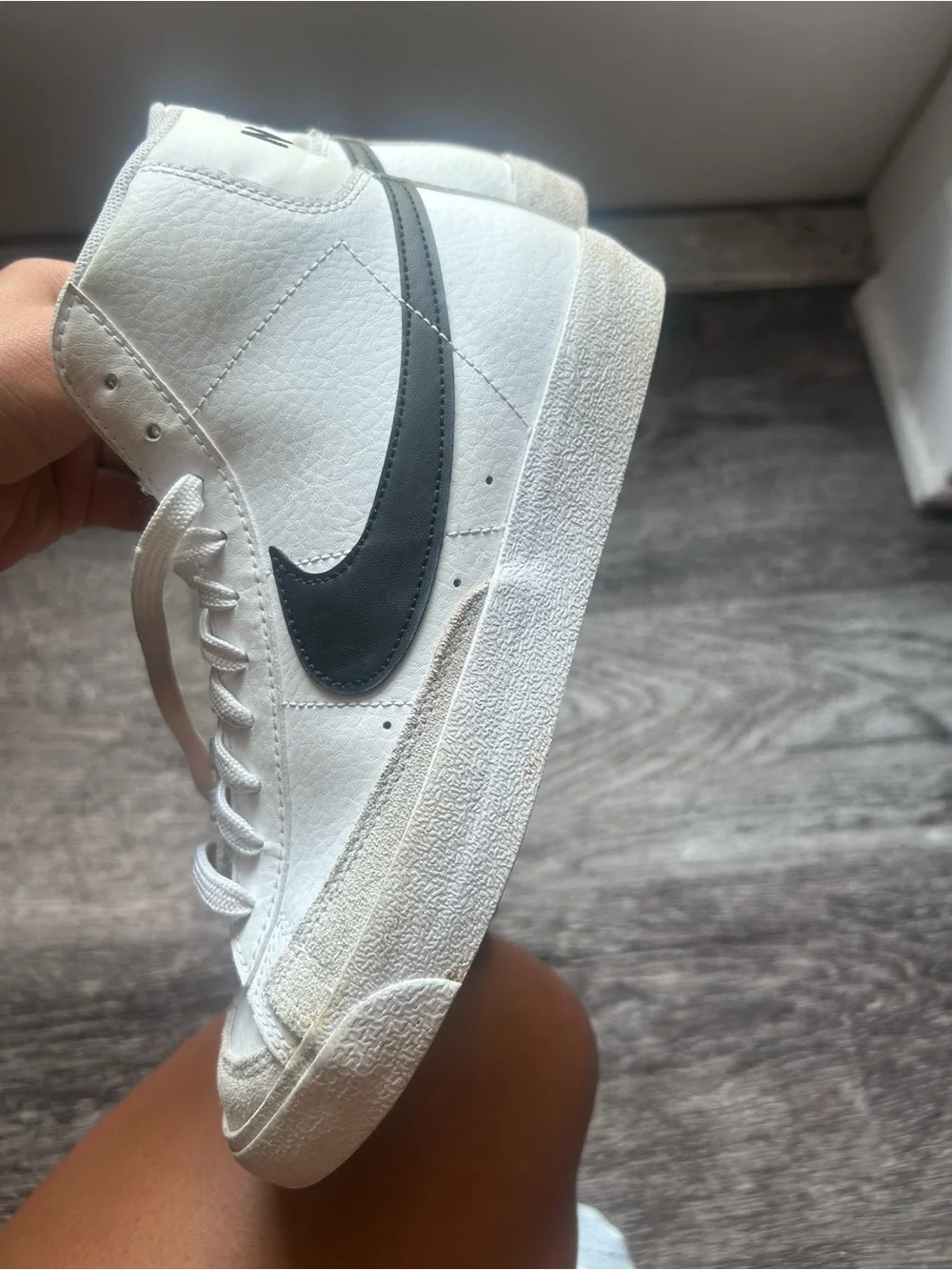 Nike White High-Top Sneakers with Black Swoosh and Pink Tongue Logo